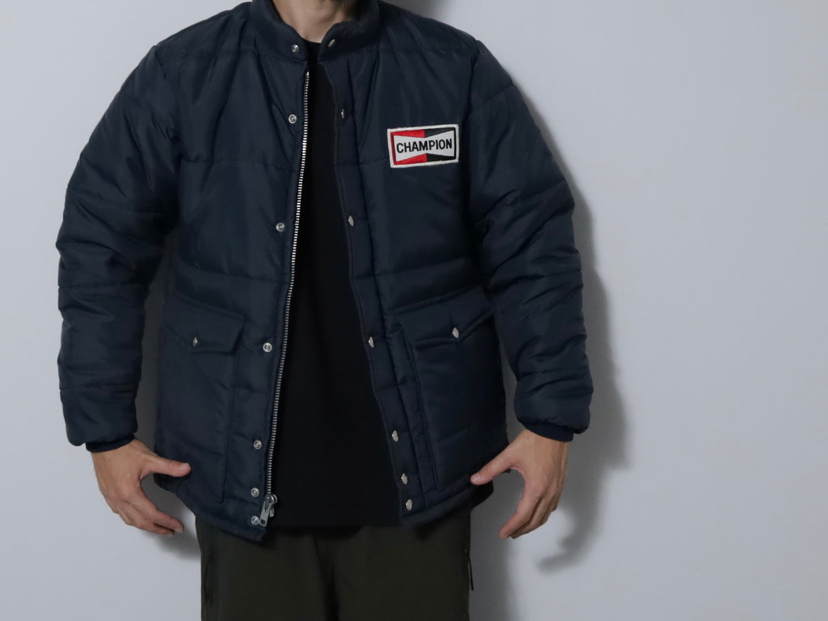 CHAMPION SPARK PLUGS RACING PUFF JACKET (MEDIUM/GOOD CONDITION)