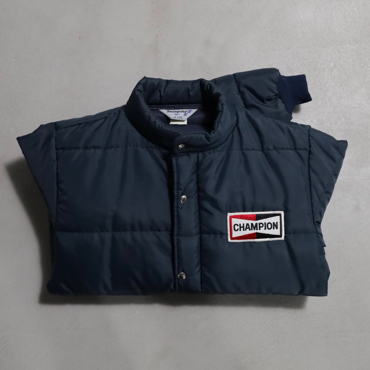 CHAMPION SPARK PLUGS RACING PUFF JACKET (MEDIUM/GOOD CONDITION)