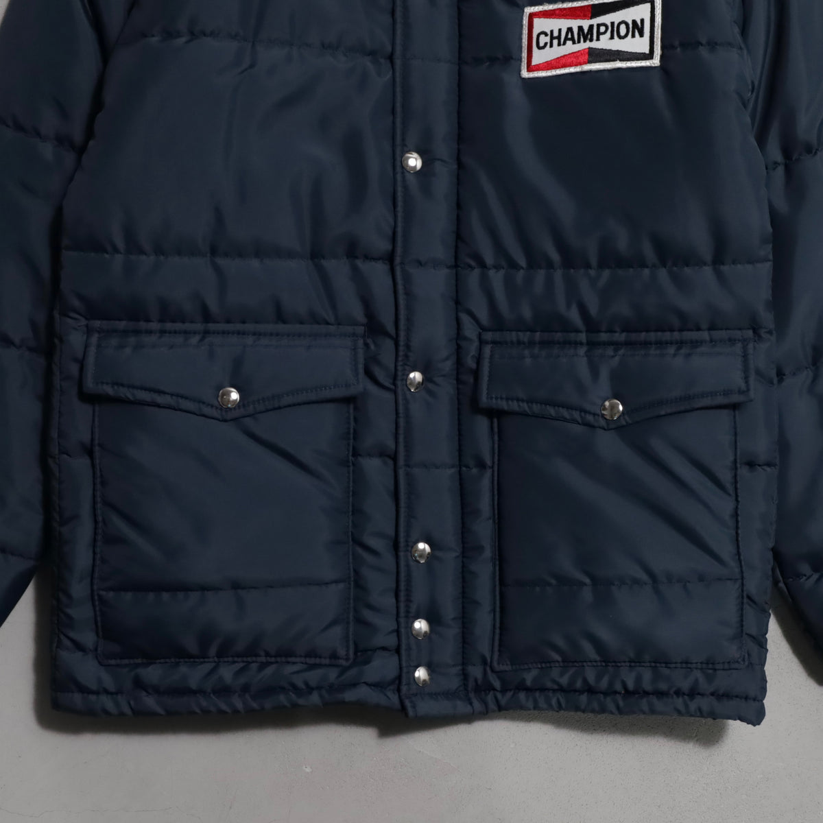 CHAMPION SPARK PLUGS RACING PUFF JACKET (MEDIUM/GOOD CONDITION)